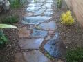 Dumaresq St. Hamilton Garden. Sandstone & Railway Sleeper Edging / Ironstone Flagstone Paths / A Variety Of Suitable Shrubs & Fruit Trees